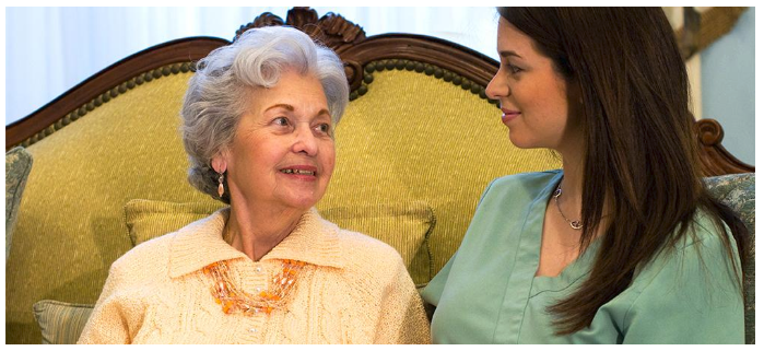 Caregiver assisting with homemaking tasks