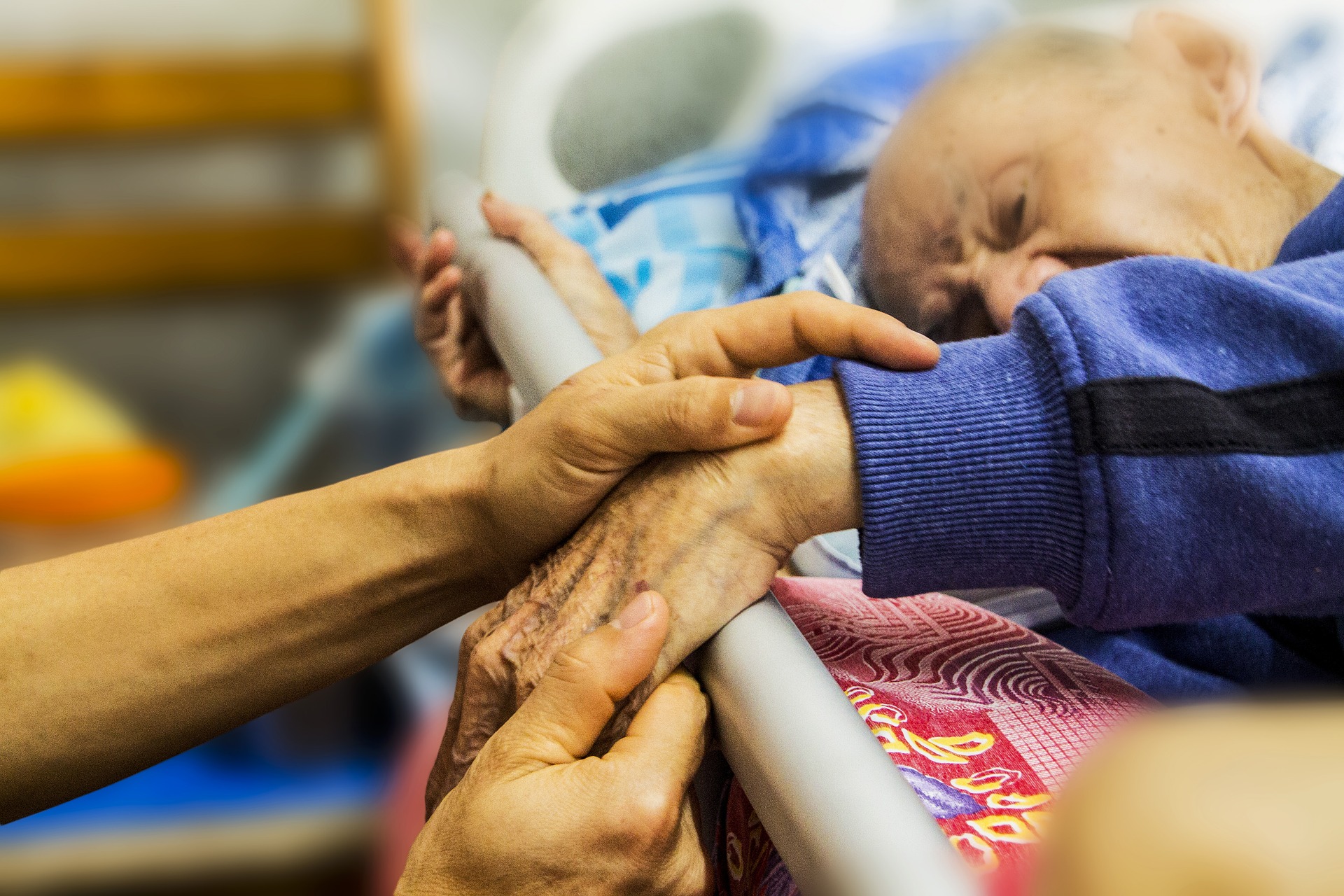 Family supporting a loved one receiving end-of-life care